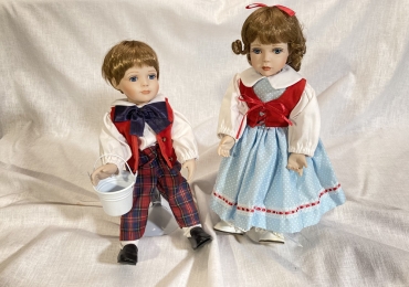 SUPER REDUCED to $40 for the pair. Collectible porcelain Jack and Jill dolls on stands (each 12″ tall)